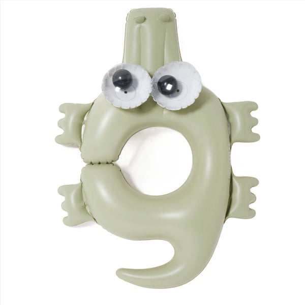 Sunnylife Kids Tube Pool Ring, Cookie the Croc Khaki with large googly eyes, isolated on a white background.