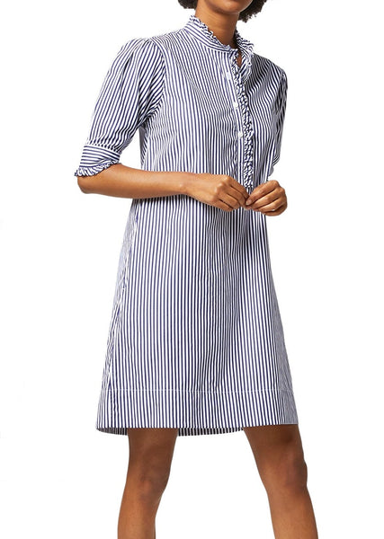 A person wearing an Ann Mashburn Elbow Sleeve Frill Dress in Italian poplin with black and white stripes, a collar, buttons, and a popover placket.
