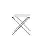 The Summit Furniture Sundeck Folding Director's Footrest features a white fabric seat and marine-grade stainless steel legs, shown against a plain white background, evoking classic campaign furniture style.
