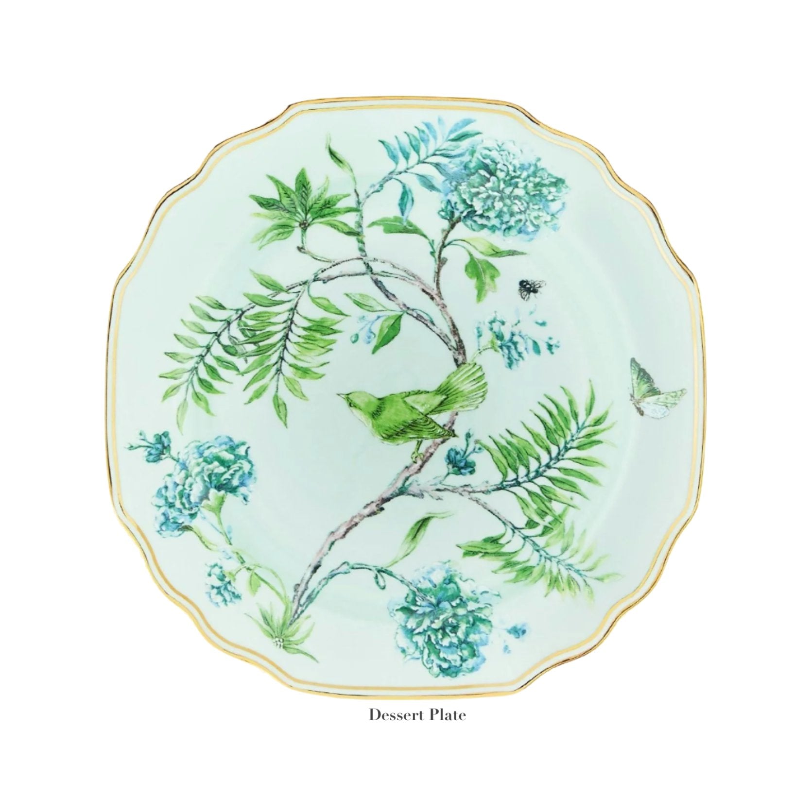 From Aquazzura Casa's Secret Garden Dinnerware and Serveware Collection, this porcelain dessert plate features a green bird, blue flowers, a butterfly, and a bee with gold accents on a light background.