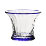 The Siena Mini Vase/Sorbet Dish Collection by William Yeoward Crystal features clear glass pieces with flared rims, blue-tinted bases, and classic fluted designs with vertical ridges for an elegant touch.