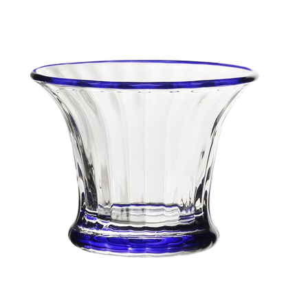 The Siena Mini Vase/Sorbet Dish Collection by William Yeoward Crystal features clear glass pieces with flared rims, blue-tinted bases, and classic fluted designs with vertical ridges for an elegant touch.