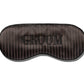 The Slip Silk Sleep Mask in black features subtle stripes and bold “GROOM” embroidery—ideal for upgrading your beauty sleep.