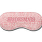 The Slip Silk Sleep Mask features a pink patterned design with "BRIDESMAID" embroidered across the front—ideal for beauty sleep before the big day.