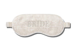 Enjoy a restful night with the Slip Silk Sleep Mask in ivory, adorned with a delicate floral pattern and "BRIDE" beautifully embroidered on the front.