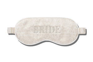 Enjoy a restful night with the Slip Silk Sleep Mask in ivory, adorned with a delicate floral pattern and "BRIDE" beautifully embroidered on the front.