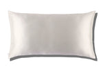 The Silk King Pillowcase by Slip is a plain white rectangular mulberry silk pillowcase shown on a white background, with its shadow cast to the right.
