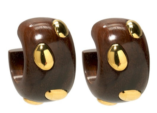 A pair of Lizzie Fortunato acacia wood massage tools with three golden-colored roller balls.