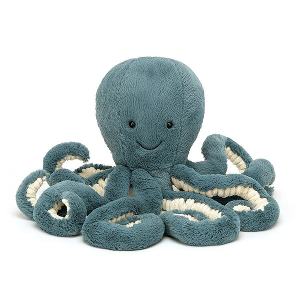 Blue Storm Octopus, a blue stuffed animal on a white background.