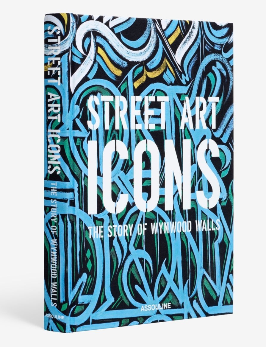 Street Art Icons: Wynwood Walls" by Assouline explores Wynwood's vibrant urban renewal with a colorful abstract street art cover.