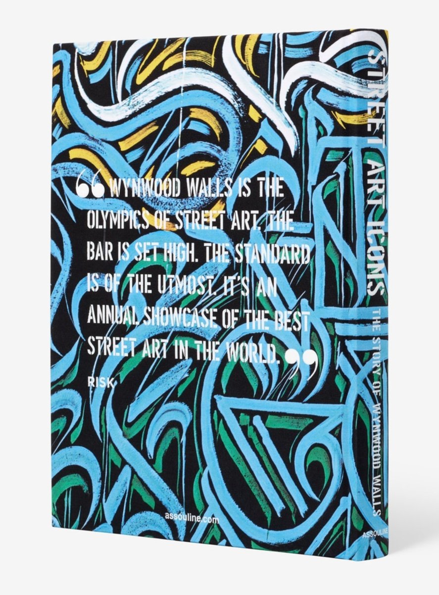 The book cover of "Street Art Icons: Wynwood Walls" by Assouline showcases abstract blue and green graffiti designs, highlighting Wynwood Walls as a top street art destination and symbol of urban renewal.