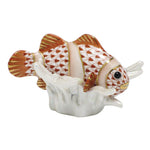 Herend’s Clownfish is a hand-painted porcelain figurine with orange-and-white patterned scales, gold accents, and a wave-like white base—a charming decorative accent for any space.