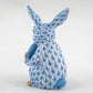 The Herend Pickleball Bunny is a blue-and-white collectible porcelain rabbit figurine with gold accents on its nose, paws, and ears, displayed from the back—a charming decorative accent with timeless appeal.