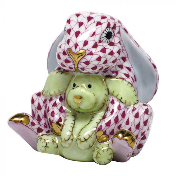 Herend Bunny and Lovey figurine of a teddy bear seated inside a decorative, patterned Easter bunny costume with hand-painted designs.
