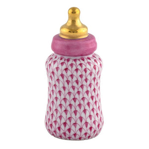 Herend Baby Bottle: Porcelain collectible featuring a hand-painted pink fish scale pattern, pink collar, and gold-colored top—ideal as a decorative accent.
