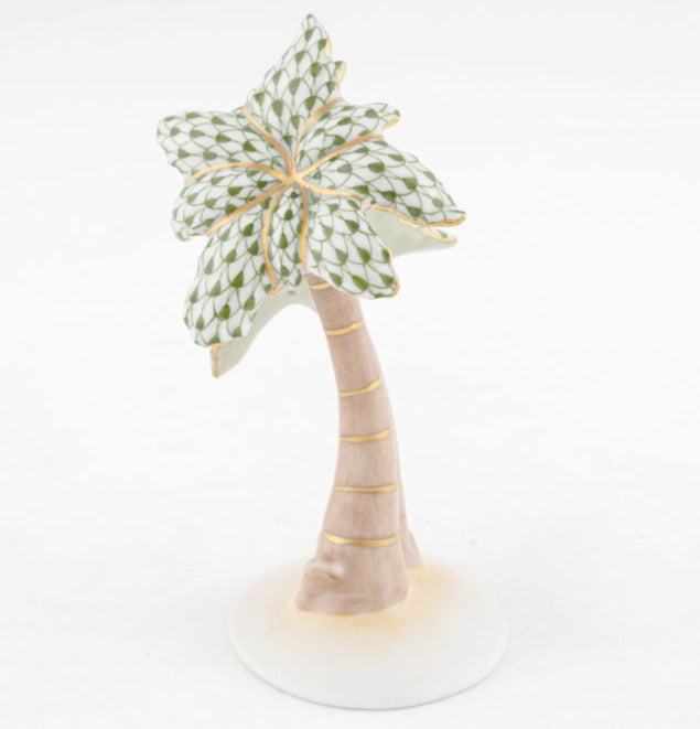 Herend Palm Tree: Porcelain figurine with hand-painted green patterned leaves and gold accents, set on a white circular base. Durable and exquisitely crafted for elegant display.