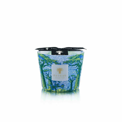 The Baobab Collection Sacred Trees Summer Yarani Candle, with its blue and green tree-patterned glass holder, evokes a baobab forest. It is adorned with the "Baobab Collection" label and a black ribbon, adding elegance to the line.