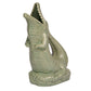 The Original Gluggle Jug's Croggle Jug is a green ceramic sculpture shaped like an upright crocodile with an open mouth, displayed on a textured base.