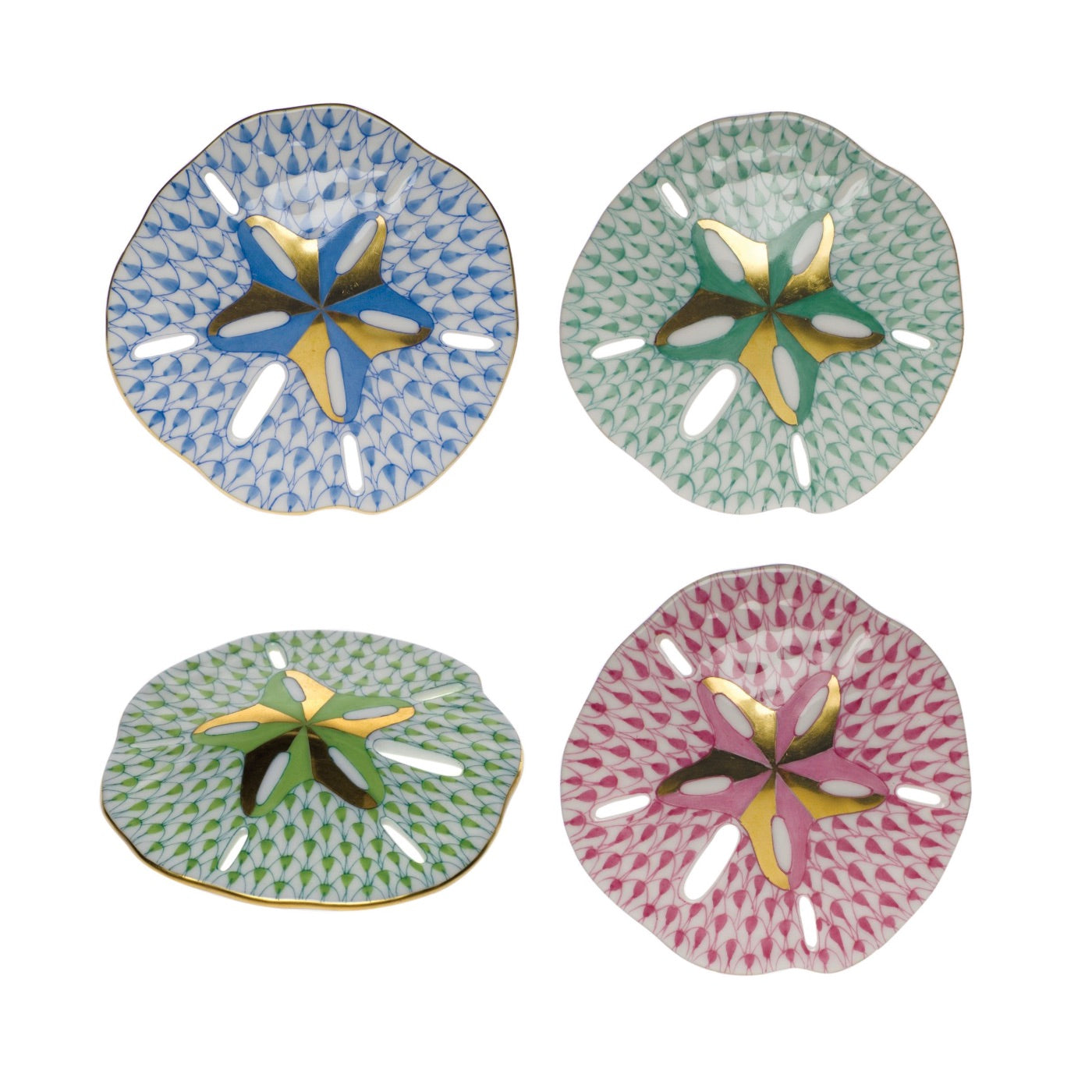 The Herend Sand Dollar set includes four decorative ceramic plates, each hand-painted with geometric patterns in blue, green, light green, and pink, and finished with gold accents for a unique artistic touch.