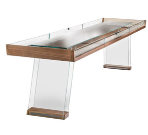 The Scivolo Shuffleboard Game Table by Impatia features Italian craftsmanship with a wood playing surface, glass side panels, and angled glass legs—offering a sleek, contemporary fusion of wood and glass.