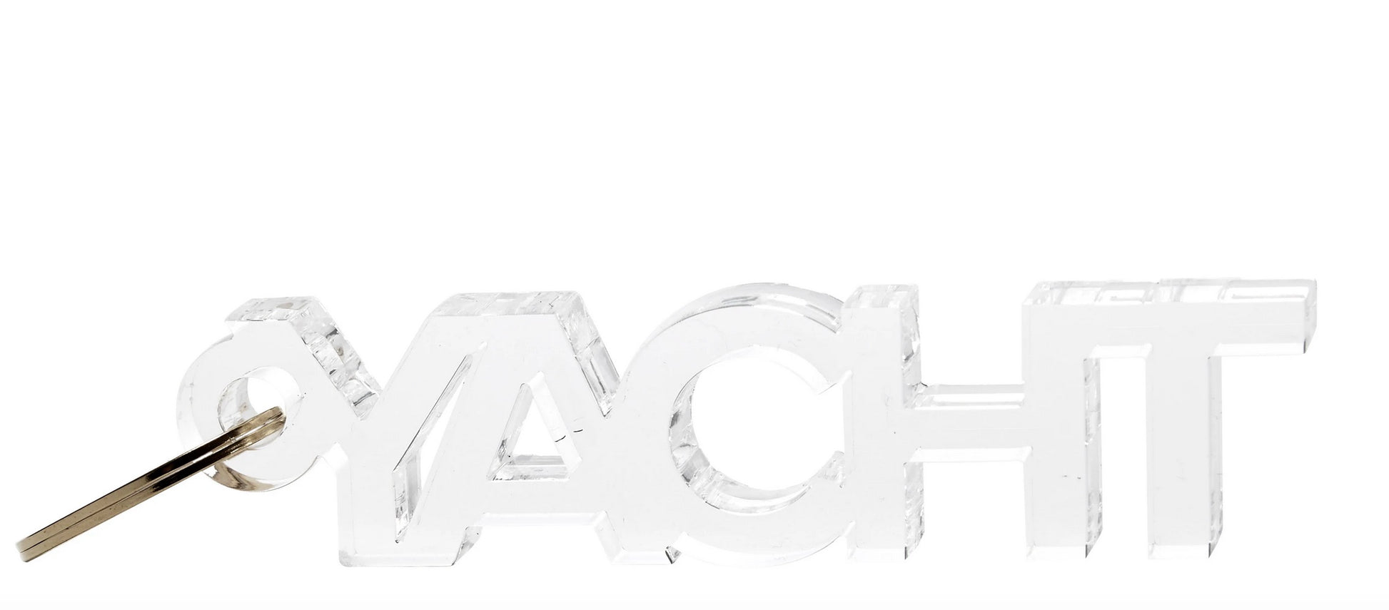The Acrylic Key Chain Collection by Tara Wilson Designs features a transparent "YACHT"-shaped keychain with a metal ring on the letter "Y," combining stylish design with key organization.