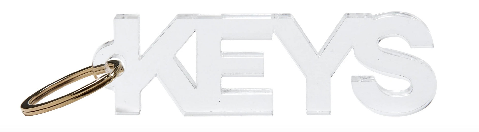 Add style to your essentials with Tara Wilson Designs' Acrylic Key Chain Collection—a clear acrylic keychain shaped like the word "KEYS" with a metal ring attached to the K.