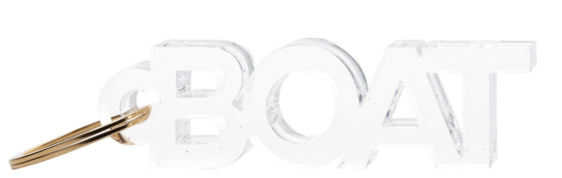 The Tara Wilson Designs Acrylic Key Chain Collection features a clear acrylic "BOAT" key chain in bold capitals, complete with a left-side gold metal key ring for a stylish touch to your keys.