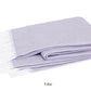 The Matouk Pezzo Throw Collection by Matouk is a cozy, brushed cotton blanket in soothing lilac with elegant white fringes. It's OEKO-TEX Standard 100 certified for safety and sustainability against its crisp white backdrop.