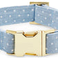 The Foggy Dog Fabric Dog Collar Collection features a light blue collar with white polka dots, finished with a gold metal buckle and D-ring for extra style.