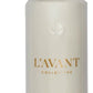 A white spray bottle labeled "L’Avant Collective" with a black nozzle from the Fresh Linen Scent Collection, known for its luxurious hand soaps and signature fresh linen fragrance.