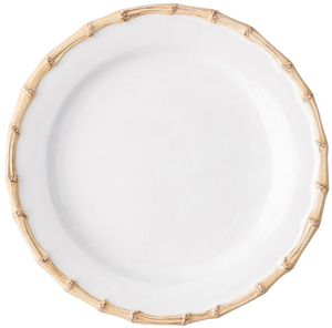 From Juliska's Classic Bamboo Dinnerware Collection, this white ceramic plate features a bamboo-inspired textured rim, adding casual elegance and global style to your table.
