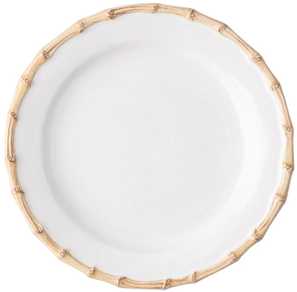 From Juliska's Classic Bamboo Dinnerware Collection, this white ceramic plate features a bamboo-inspired textured rim, adding casual elegance and global style to your table.