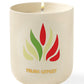 A lit scented candle with an Assouline "Travel Candle Tulum Gypset" logo printed on the side, exuding earthy aromas.
