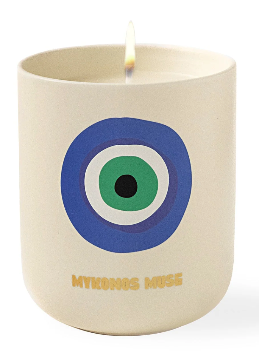 A Travel Candle Mykonos Muse by Assouline.
