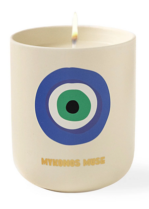A Travel Candle Mykonos Muse by Assouline.