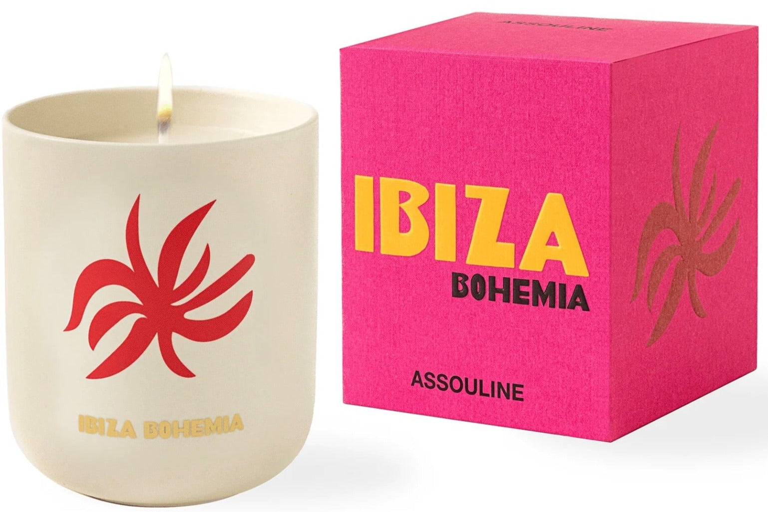 A Travel Candle Ibiza Bohemia by Assouline in a white holder with a red design sits next to a pink box labeled "Ibiza Bohemia Assouline," spreading the refreshing scents of lemon bergamot and subtle patchouli undertones throughout the air.