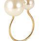 The Kim Seybert Pearl Napkin Ring features two large white pearls of varying sizes on an open gold band—ideal for adding elegance to Bridal Shower or Wedding table décor.