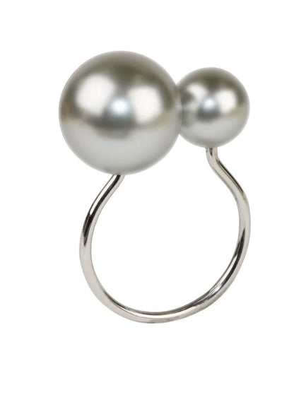 The Kim Seybert Pearl Napkin Ring features two large, round gray pearls of different sizes set on a simple curved band—an elegant accessory for wedding tables or a unique bridal shower gift.