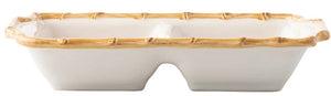 The Juliska Bamboo Two Section Server is a rectangular white ceramic dish with a bamboo motif rim and deep compartments—ideal for elegant garden parties.