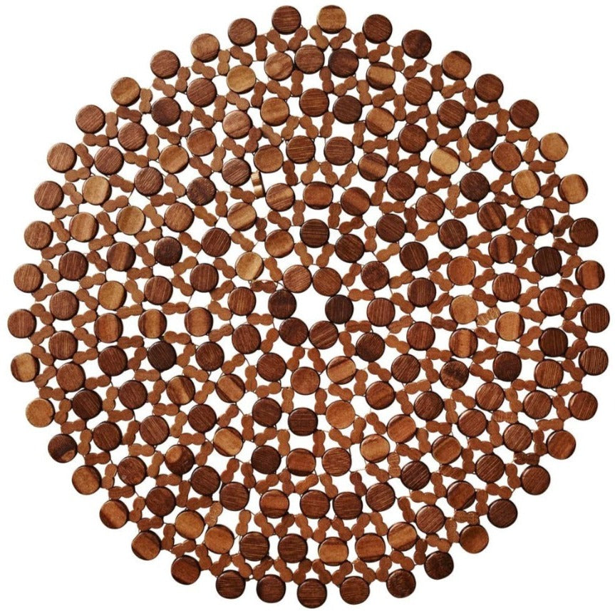 The Kim Seybert Bamboo Round Placemat features circular bamboo pieces in a geometric spiral, ideal for outdoor table décor or adding flair to formal settings.
