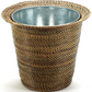 Handmade artisan Calaisio Rattan basket with a metal interior liner.