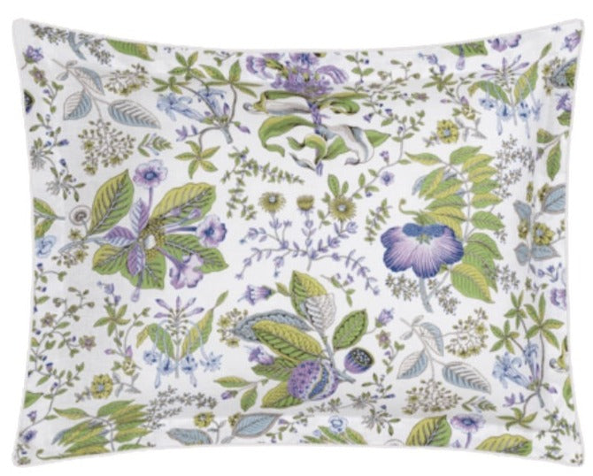 The Matouk Pomegranate Roman Linen Bedding Collection in Lilac features a rectangular pillowcase with green, purple, and blue floral motifs on white OEKO-TEX Standard 100 certified linen for comfort and peace of mind.