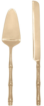 The Blue Pheasant Liliana Polished Gold Cake Serving Set features a pie server and knife with bamboo-style handles, shown side by side on a white background for a sophisticated touch and subtle island flair.