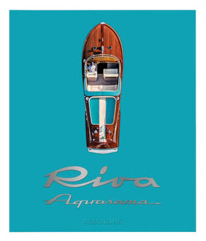 An aerial view of the Riva Aquarama by Assouline showcases its elegant wooden deck and seating. This iconic vessel, a hallmark of Italian design crafted by Carlo Riva, displays "Riva Aquarama Assouline" beneath it.
