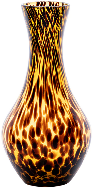 Introducing the Juliska Puro Tortoiseshell Carafe, a stunning piece with a narrow neck and a wide, rounded base. This exquisite brown and amber speckled glass vase by Juliska beautifully captures the essence of elegance, making it a perfect addition to your dining table or as a centerpiece in the guest room.