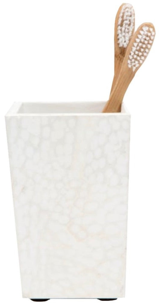 A white, textured toothbrush holder from the Pigeon & Poodle Callas Bath Collection, boasting an elegant mosaic finish, holds two wooden toothbrushes with white bristles.