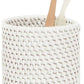 The Dalton Bath Collection by Pigeon & Poodle features a handmade rattan cup, elegantly holding one wooden and one plastic toothbrush, set against a white background.