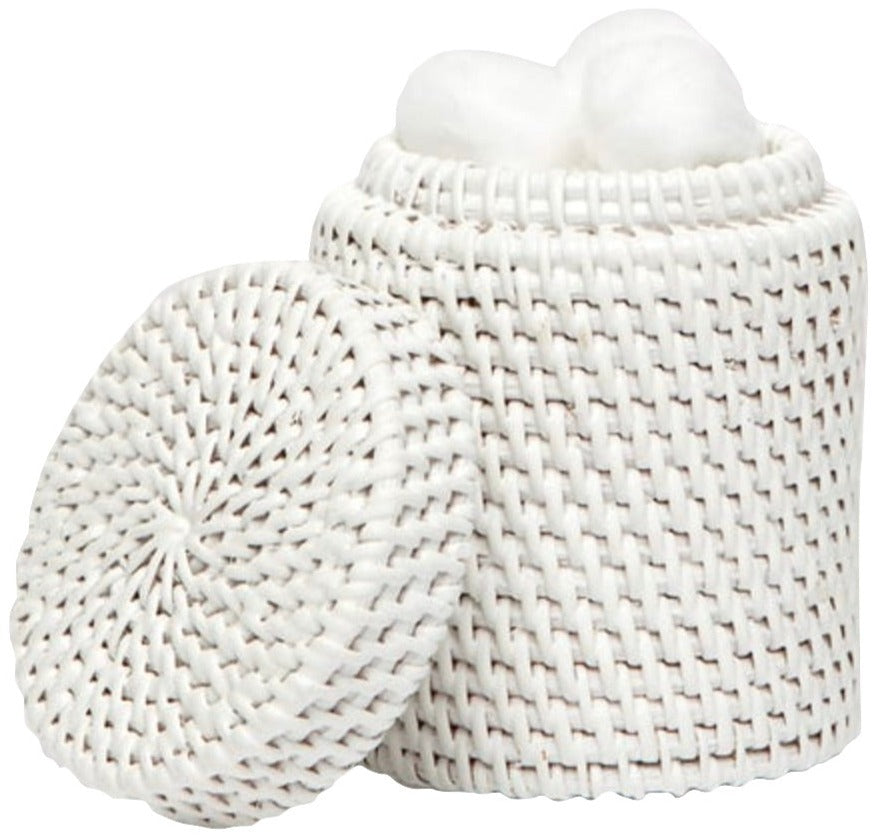 The Dalton Bath Collection by Pigeon & Poodle features a white woven container with a matching lid, elegantly holding white cotton balls inside.