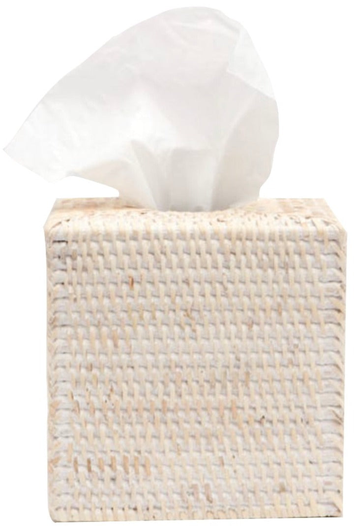 The Dalton Bath Collection by Pigeon & Poodle features a woven rattan tissue box holder with expert craftsmanship, shown with a white tissue partially pulled out.