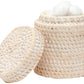 From the Dalton Bath Collection by Pigeon & Poodle, this round woven rattan basket with a detached lid displays detailed craftsmanship and holds white cotton balls.